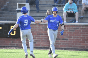 st louis baseball teammates high five