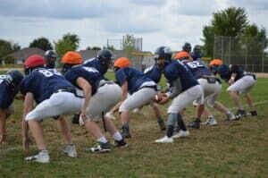 football team practicing using gorout devices