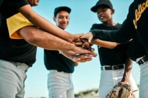 baseball team in huddle