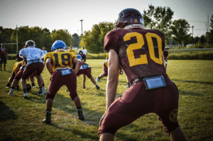 football offense lined up at practice