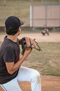 youth baseball pitcher practicing