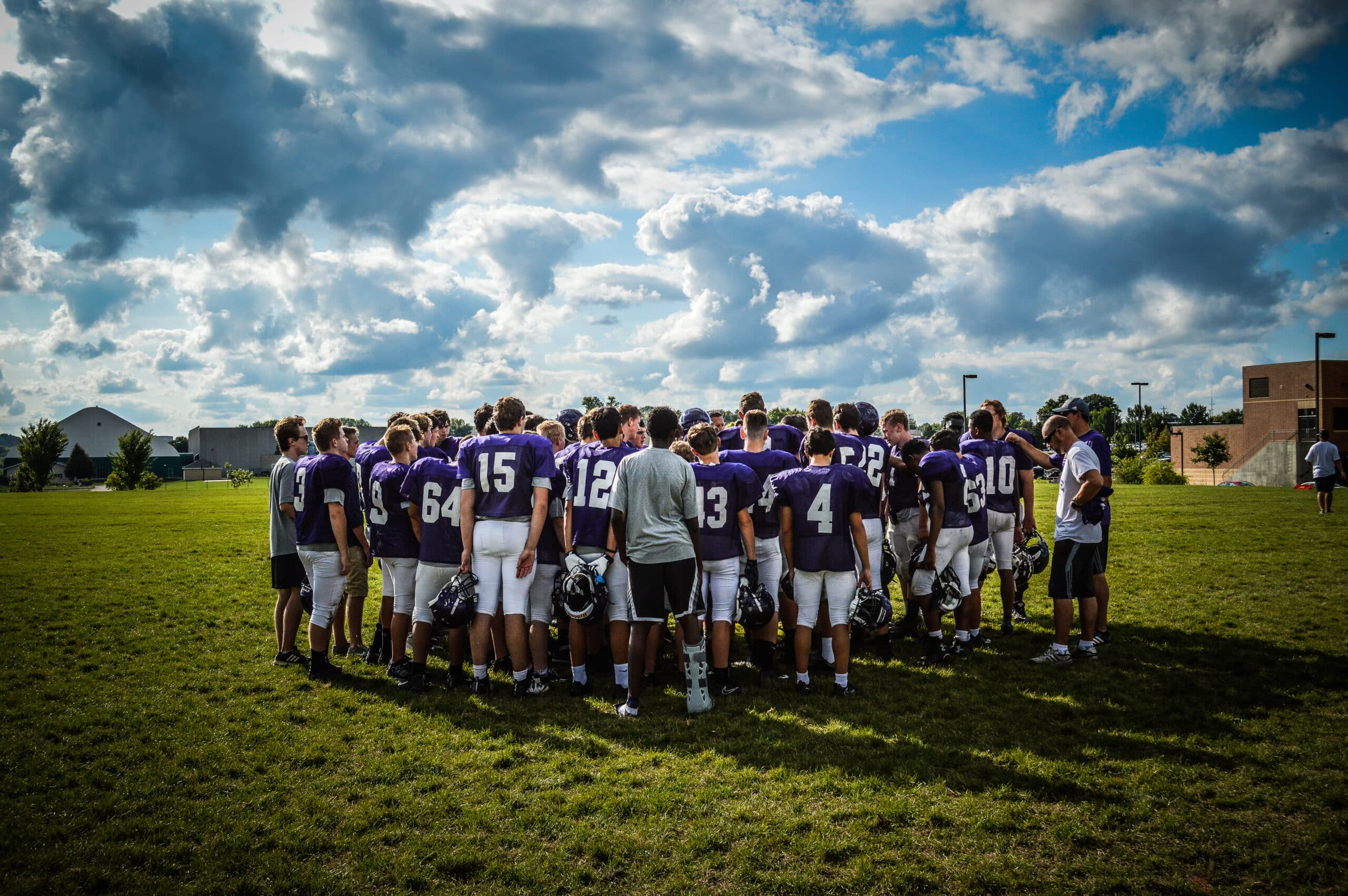 football team huddle after practice
