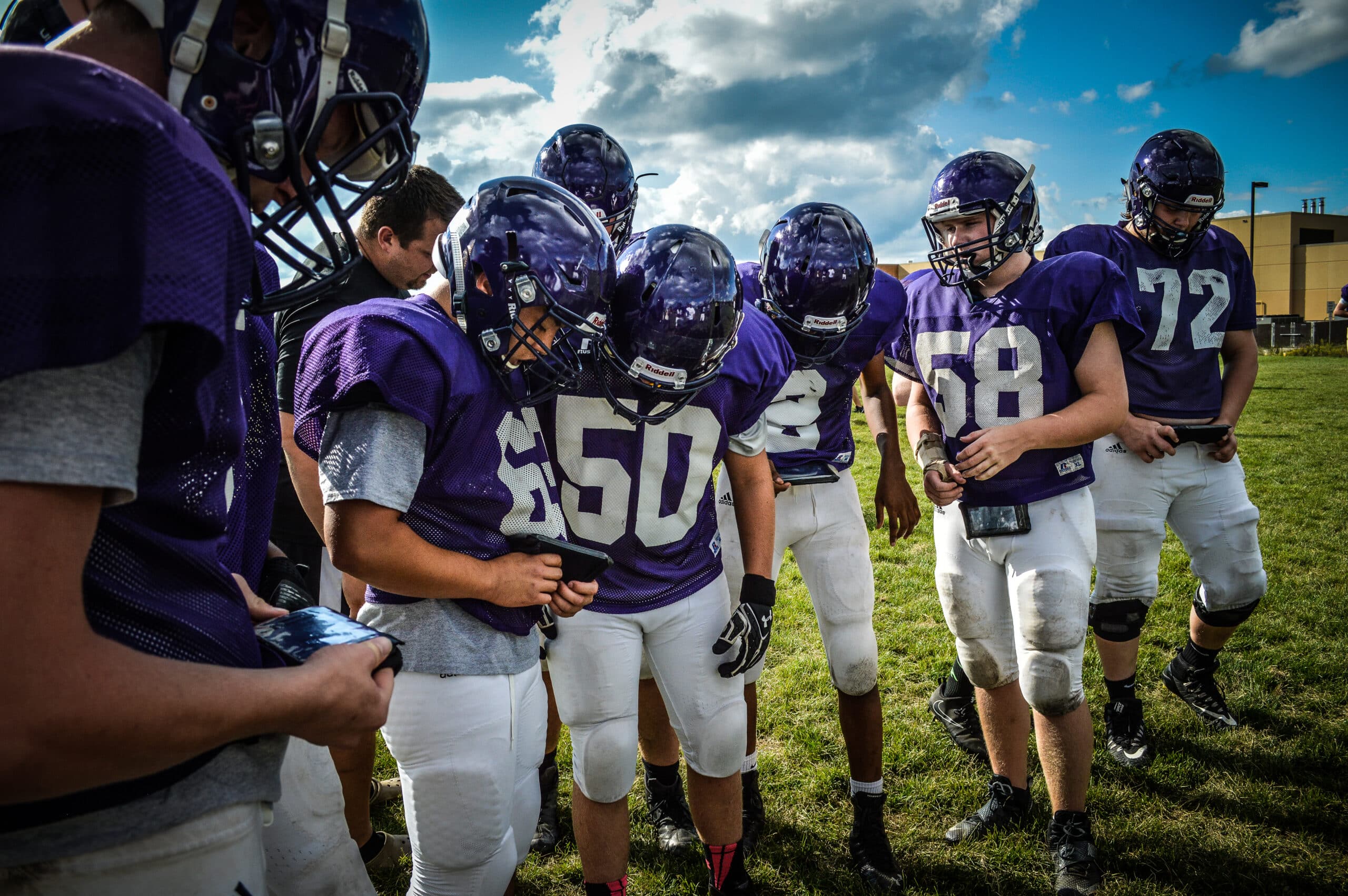 youth football players using gorout practice device