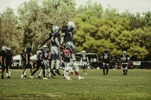 Football players celebrating touchdown