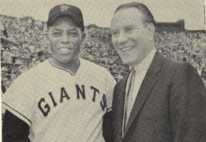 willie mays posing for photo