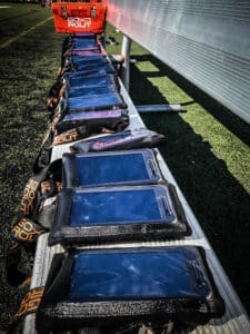 batch of gorout devices on football bench
