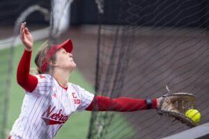 Softball player catching fly ball