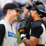 A division I baseball pitcher and catcher communicating