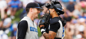 A division I baseball pitcher and catcher communicating