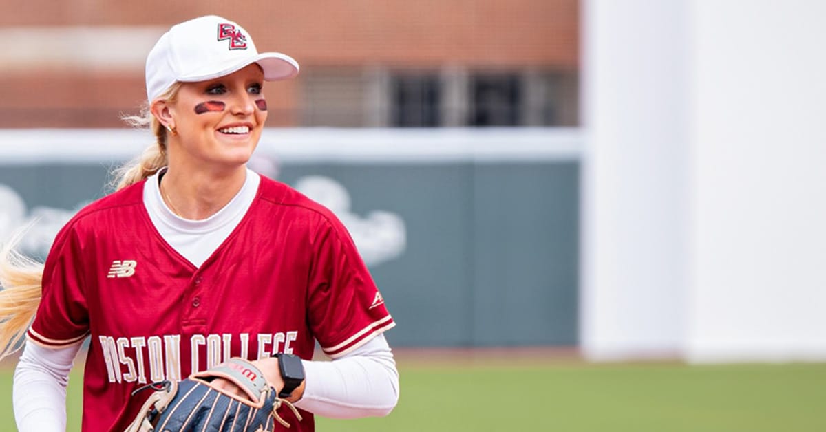 Division I College Softball player smiling while wearing wearable sports technology