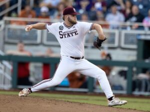 Collegiate pitcher delivers a pitch in a game 