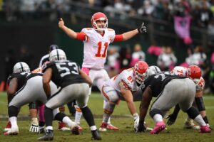 Former Chiefs quarterback Alex Smith calling an audible at the line of scrimmage