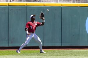 College outfielder making a play on a fly ball