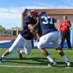 1-on-1 defensive line drills at practice