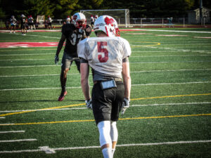football receiver lining up at practice