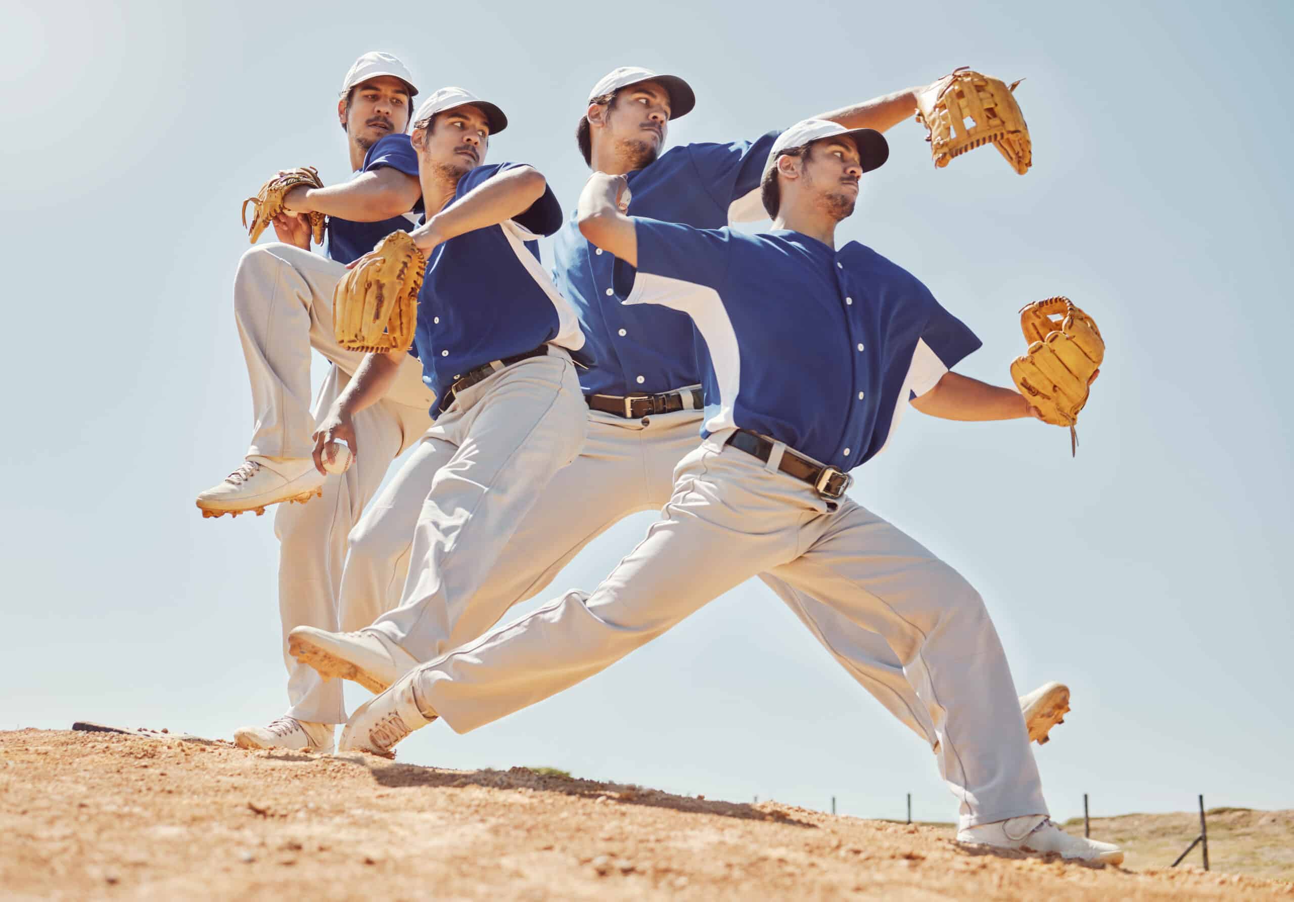 baseball pitcher throwing on mound