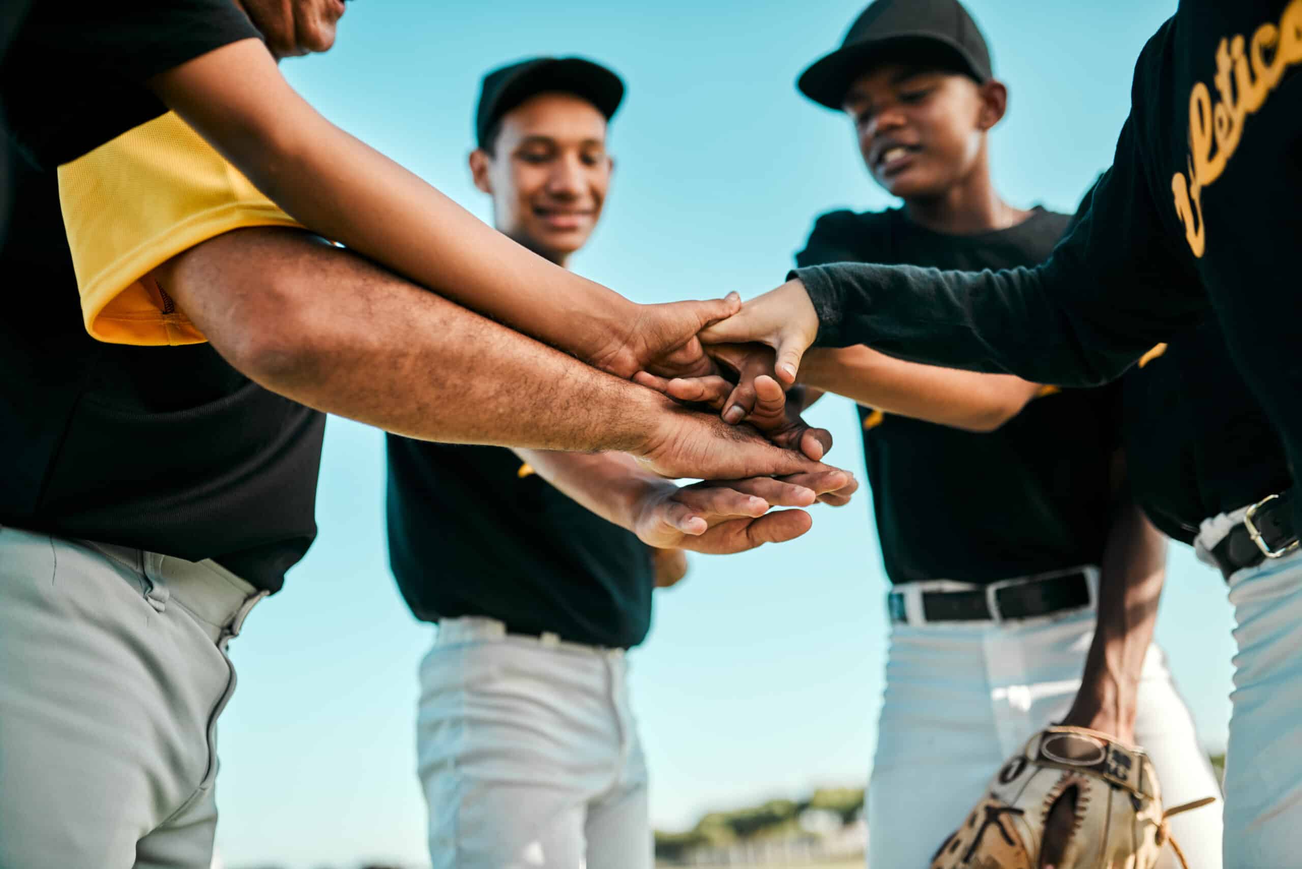 baseball team in huddle