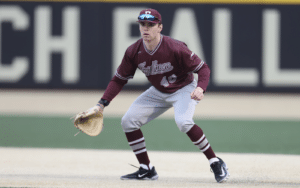 left handed fordham first baseman fielding ball