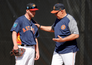 houston astros pitching coach talking to pitcher