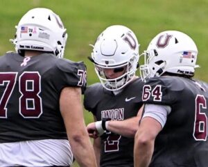 quarterback reading play off wristband in game