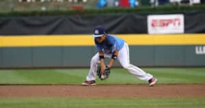 youth baseball infielder fielding ground ball at little league world series