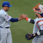 new york mets pitcher and catcher shaking hands