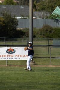 youth baseball outfielder in game