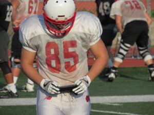 football player looking at gorout device
