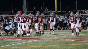 football players looking over for a call