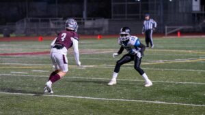 football wide receiver running route