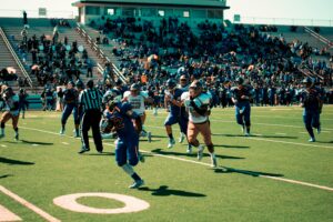 football player running away with explosive play