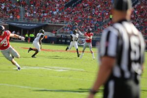 football trick play with running back throwing