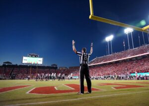 football referee signaling good kick