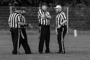 group of football officials