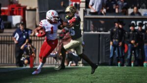 football player grabbed by facemask