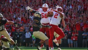 football quarterback getting sacked