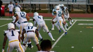 football kicker kicking off
