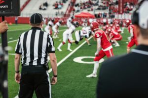 football referee on line of scrimmage